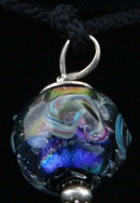 Kumihimo traditional “Edo-yatsu” silk braid, silver findings, flameworked Moretti glass and dichroic glass focal bead.
